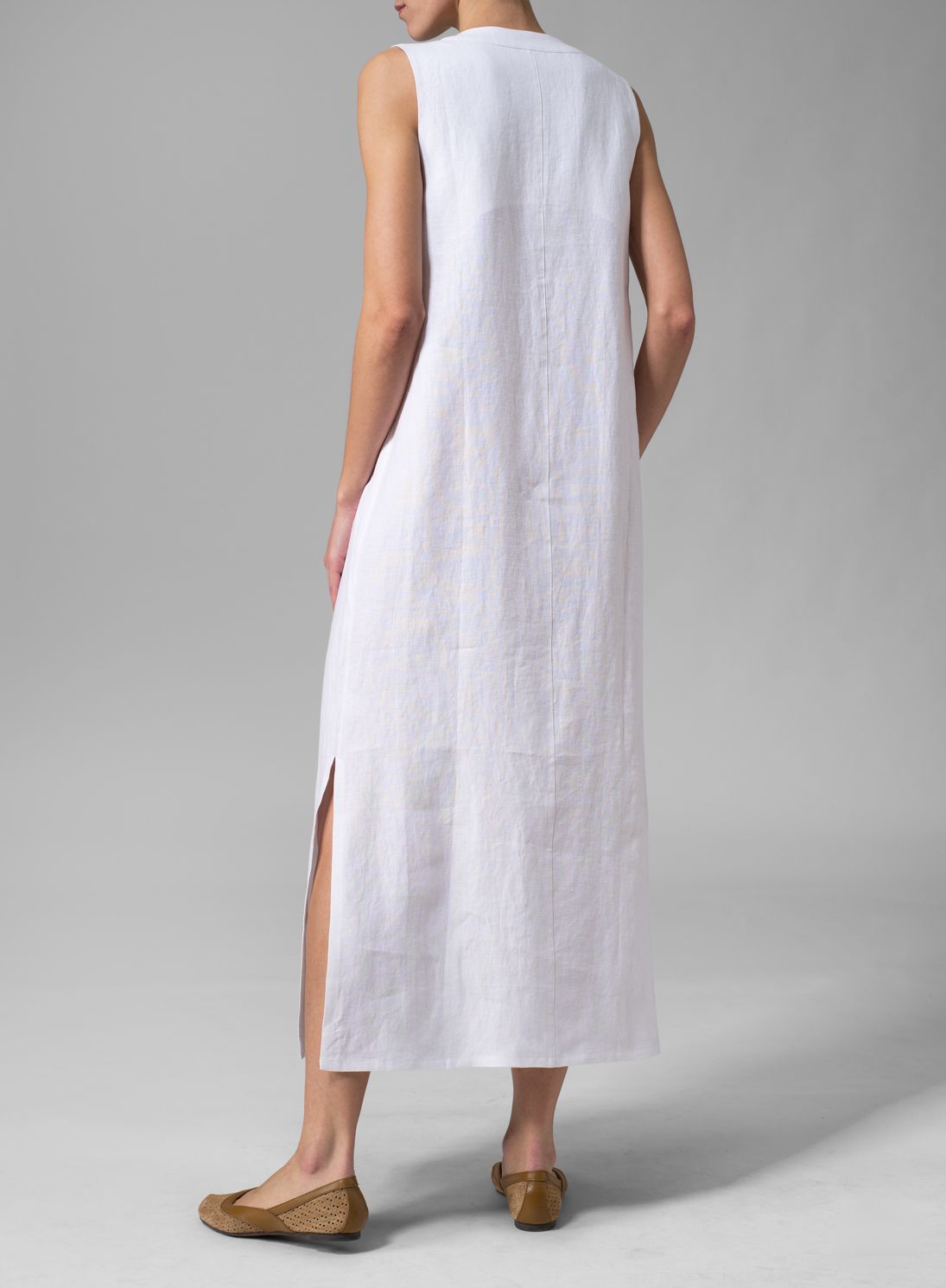 sleeveless white gown