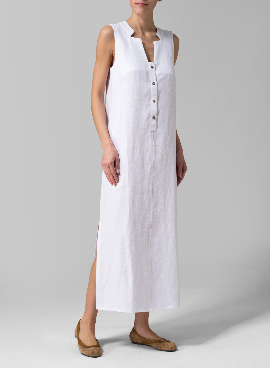 sleeveless white gown